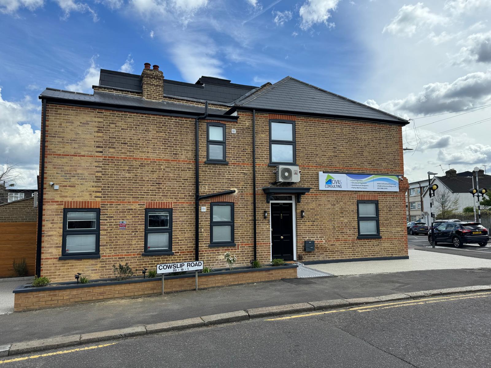 ilford house with 3 cars in parking